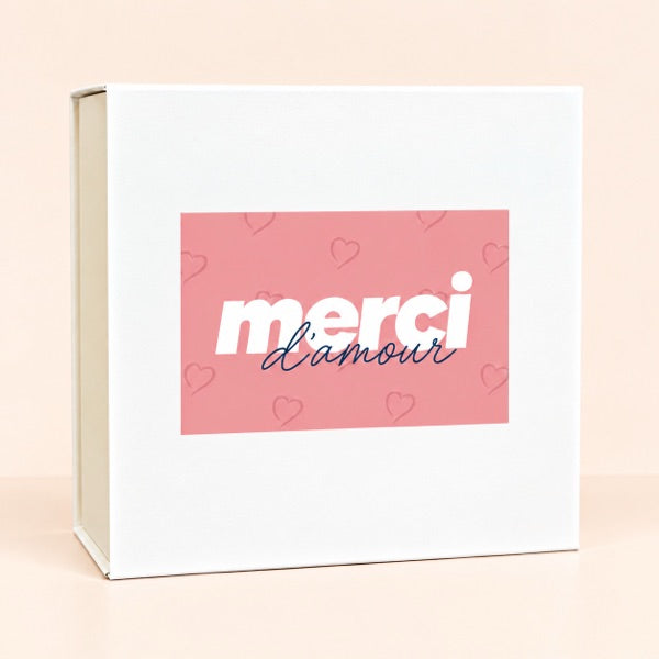 Boîte avec l'étiquette Merci (rose)